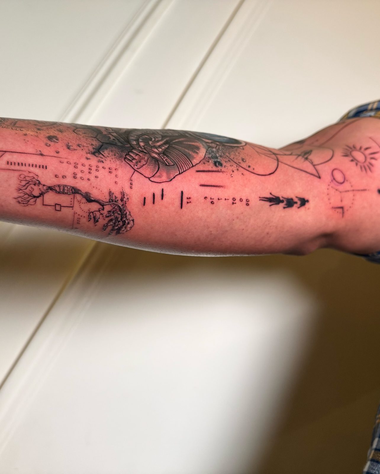 Geometric blackwork tattoo in Hauz Khas